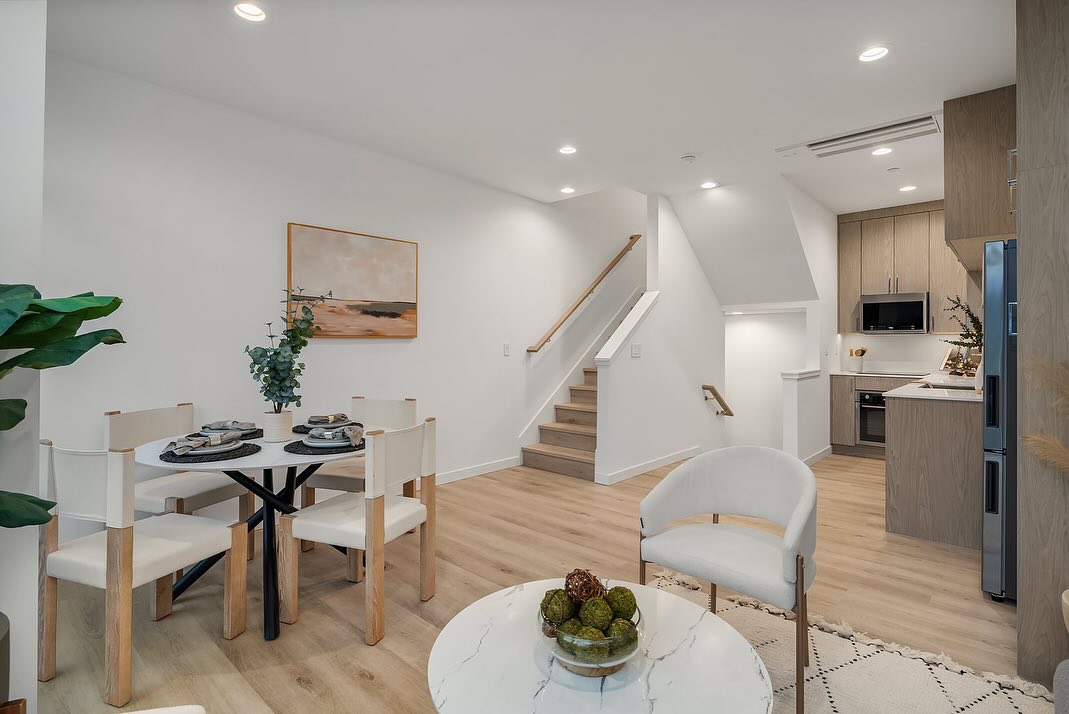 interior photo toward stairs in urban infill townhome.