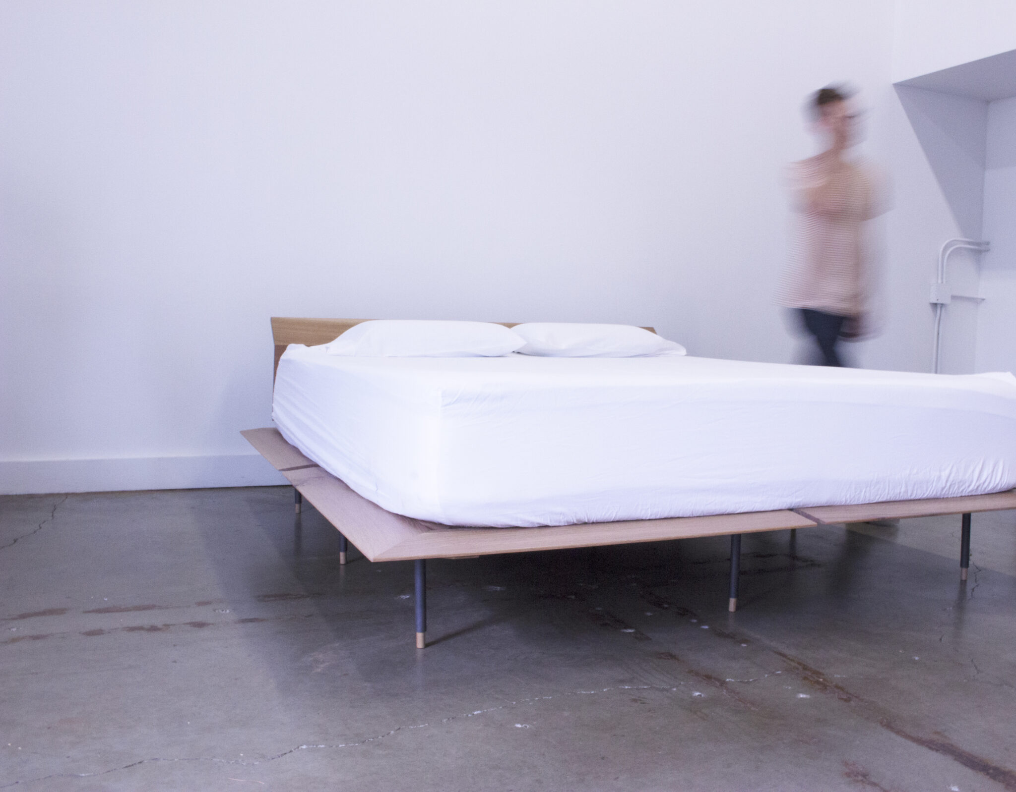 photo of bed frame with mattress.