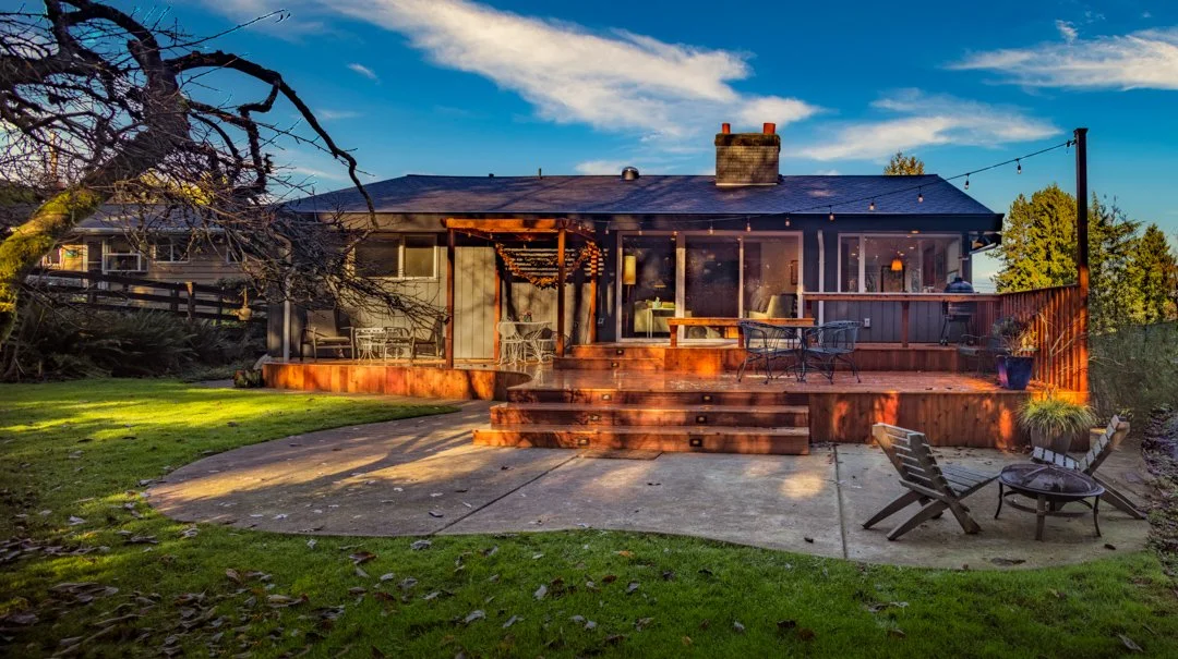 mid-century modern exterior view from backyard.