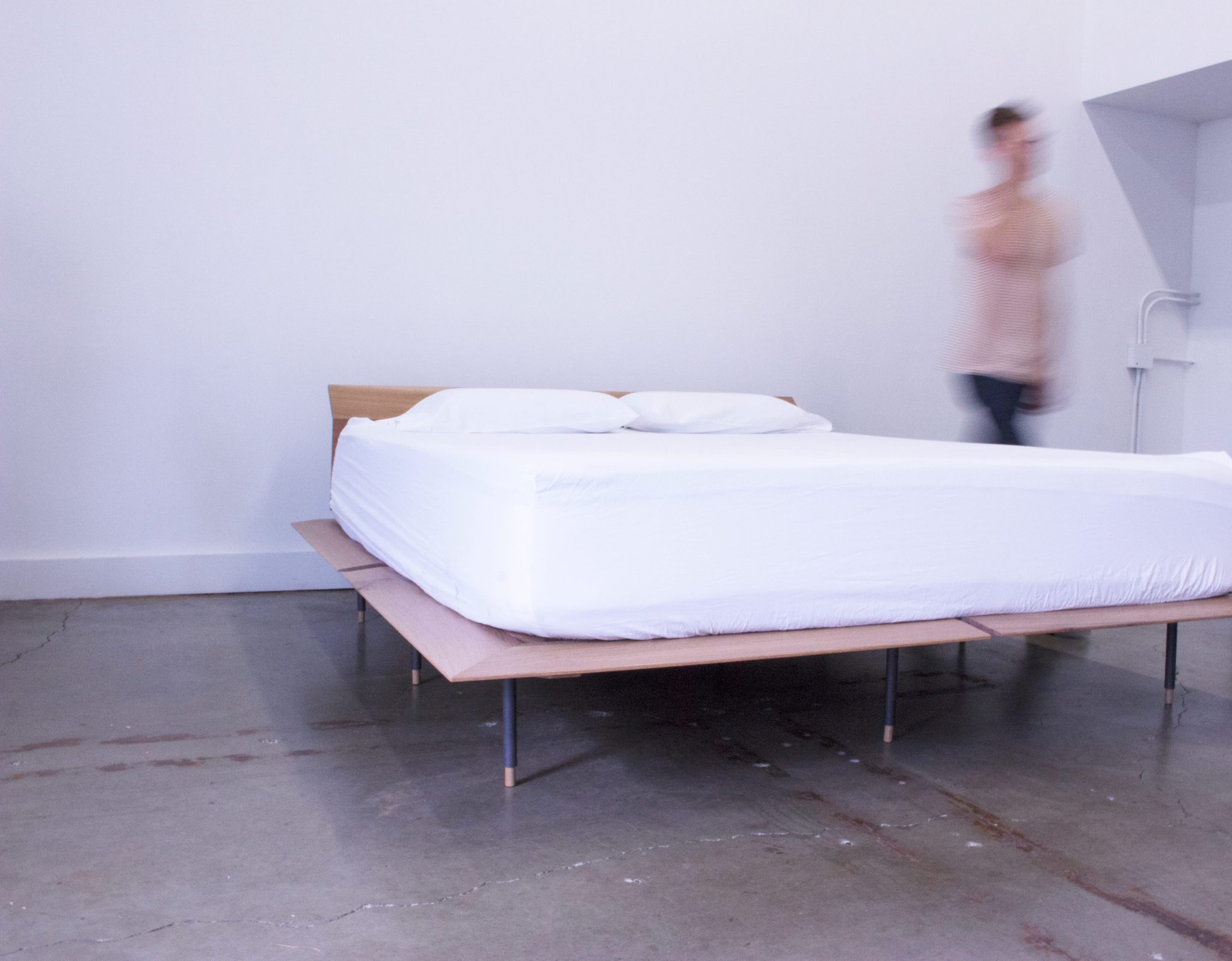 photo of bed frame with mattress.